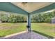 Covered patio offers an outdoor grill and a spacious backyard at 11236 Beebalm Cir, Lakewood Ranch, FL 34202