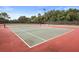 Outdoor tennis court with well-maintained surface and net, perfect for recreational games and exercise in the community at 11236 Beebalm Cir, Lakewood Ranch, FL 34202