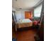 Bedroom with a queen bed, dresser, and natural light from the windows at 1127 Tyrone N Ct, St Petersburg, FL 33710