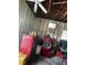 Garage laundry area with visible washer, dryer, stacked storage containers, and a concrete floor at 1127 Tyrone N Ct, St Petersburg, FL 33710
