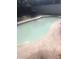 Backyard pool with a concrete pool deck at 1127 Tyrone N Ct, St Petersburg, FL 33710