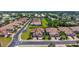 Beautiful aerial view of a residential area featuring pristine landscaping and pond at 1203 Calle Grand St, Bradenton, FL 34209