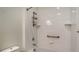 Bathroom with a tiled shower and bathtub at 1203 Calle Grand St, Bradenton, FL 34209