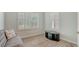 Bright bedroom featuring wood floors, plantation shutters and modern accent furniture at 1203 Calle Grand St, Bradenton, FL 34209