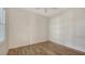 Bright bedroom featuring wood flooring and a ceiling fan at 1203 Calle Grand St, Bradenton, FL 34209
