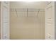 Open closet with rod and shelving, ready for efficient organization and storage at 1203 Calle Grand St, Bradenton, FL 34209