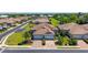 Beautiful home with a brick driveway, three-car garage, and mature landscaping at 1203 Calle Grand St, Bradenton, FL 34209