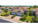 Beautiful home with a brick driveway, three-car garage, and mature landscaping at 1203 Calle Grand St, Bradenton, FL 34209