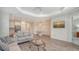 Spacious living room showcasing open concept layout, wood floors, and modern furnishings at 1203 Calle Grand St, Bradenton, FL 34209