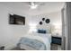 Comfortable bedroom with a cozy bed, stylish decor, and a relaxing atmosphere at 12440 Wellen Golf St # 105, Venice, FL 34293