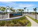 Wellen Park Golf & Country Club entrance with lush landscaping and prominent signage at 12440 Wellen Golf St # 105, Venice, FL 34293