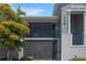 Charming two-story condo with screened patios, offering relaxing outdoor living spaces at 12440 Wellen Golf St # 105, Venice, FL 34293