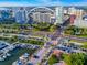 Aerial view showcases the condo's location near a marina, green spaces, and downtown at 1255 N Gulfstream Ave # 402, Sarasota, FL 34236