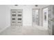 Bright bedroom boasts marble floors, a sliding door closet, and an ensuite bathroom at 1255 N Gulfstream Ave # 402, Sarasota, FL 34236