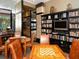 Cozy common room featuring a bookcase, media center, and comfortable seating at 1255 N Gulfstream Ave # 402, Sarasota, FL 34236