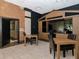 Well-lit common room with tables, chairs, and a modern entertainment center at 1255 N Gulfstream Ave # 402, Sarasota, FL 34236