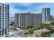 A modern condo building featuring many balconies and scenic city views at 1255 N Gulfstream Ave # 402, Sarasota, FL 34236