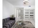 Bright living room with modern finishes, plush seating, and stylish decor creates inviting ambiance at 1255 N Gulfstream Ave # 402, Sarasota, FL 34236