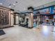 Spacious lobby featuring tiled floors, stylish seating, glass partitions and elegant decor at 1255 N Gulfstream Ave # 402, Sarasota, FL 34236