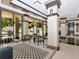 Luxurious lobby area with decorative pillars, large windows, designer seating, and patterned flooring at 1255 N Gulfstream Ave # 402, Sarasota, FL 34236
