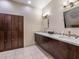 Community restroom showing sinks, mirrors and lockers at 1255 N Gulfstream Ave # 402, Sarasota, FL 34236