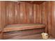 Classic sauna showing wooden bench and bucket at 1255 N Gulfstream Ave # 402, Sarasota, FL 34236