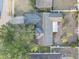Aerial view of home with fenced backyard, and large mature shade tree at 12805 Raysbrook Dr, Riverview, FL 33569