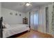 Comfortable bedroom with decorative curtains and ceiling fan at 12805 Raysbrook Dr, Riverview, FL 33569