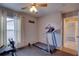 Bright exercise room features workout equipment and natural light at 12805 Raysbrook Dr, Riverview, FL 33569