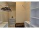 Walk-in closet features shelving and a bench at 12805 Raysbrook Dr, Riverview, FL 33569