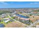 Scenic aerial of waterfront homes with beautiful canals, lush greenery, and tropical landscaping at 1349 Aqui Esta Dr # 143, Punta Gorda, FL 33950