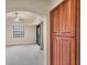 Bedroom with a window, a sliding door, and a built in wooden pantry at 1349 Aqui Esta Dr # 143, Punta Gorda, FL 33950