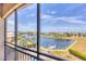 Enjoy the waterfront view of the harbor with blue skies from this charming condo in a waterfront community at 1349 Aqui Esta Dr # 143, Punta Gorda, FL 33950