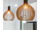 Contemporary kitchen pendant lighting featuring wood slat construction and warm ambient light at 14009 Daniels Ave, Port Charlotte, FL 33953