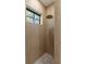 Tiled shower with pebble floor and rainfall shower head at 14009 Daniels Ave, Port Charlotte, FL 33953
