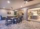 Expansive lanai with outdoor dining and living areas, seamlessly connected to the home at 15037 Montello Way, Lakewood Ranch, FL 34211