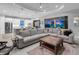 Open-concept living room flows into the kitchen, creating a spacious and inviting area for entertaining at 15037 Montello Way, Lakewood Ranch, FL 34211