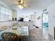 Dining area showcasing a wicker table and chairs set adjacent to the kitchen at 1526 Mission Hills Blvd # 18B, Clearwater, FL 33759