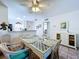 Inviting dining area with views of the kitchen and a bedroom at 1526 Mission Hills Blvd # 18B, Clearwater, FL 33759