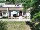 Charming condo featuring a quaint front patio with seating and room for relaxing at 1526 Mission Hills Blvd # 18B, Clearwater, FL 33759