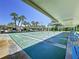 Community shuffleboard courts are covered for shade and feature benches for comfortable viewing at 1526 Mission Hills Blvd # 18B, Clearwater, FL 33759