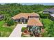 An elevated shot of a single Gathering home showcasing the lawn and driveway at 15518 29Th E St, Parrish, FL 34219
