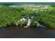 Stunning aerial view of the property and boat launch on the river; a boater's dream at 15518 29Th E St, Parrish, FL 34219