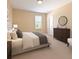 A bright bedroom featuring a comfortable bed, neutral carpet, and tasteful decor at 15518 29Th E St, Parrish, FL 34219