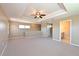 Upstairs bonus room with large window and ensuite bathroom access at 15518 29Th E St, Parrish, FL 34219