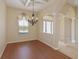 Dining room with beautiful light fixtures, offering an inviting space for meals and gatherings at 15518 29Th E St, Parrish, FL 34219