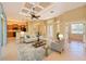 Bright and open-concept living area with a view of the kitchen and dining, perfect for gatherings at 15518 29Th E St, Parrish, FL 34219