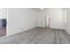 Large bedroom with soft carpet, slider to lanai, and ensuite bathroom at 17343 Cayo Ln, Punta Gorda, FL 33955