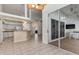 Open-concept living area flows seamlessly into the kitchen and lanai for easy entertaining at 17343 Cayo Ln, Punta Gorda, FL 33955