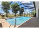 A screened-in pool offers a private and relaxing outdoor space at 17343 Cayo Ln, Punta Gorda, FL 33955